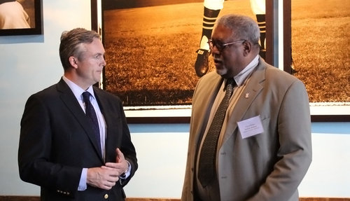TGPCC President Matt Smith speaks with Allegheny County Councilman DeWitt Walton at the Roberto Clemente Museum in Lawrenceville.